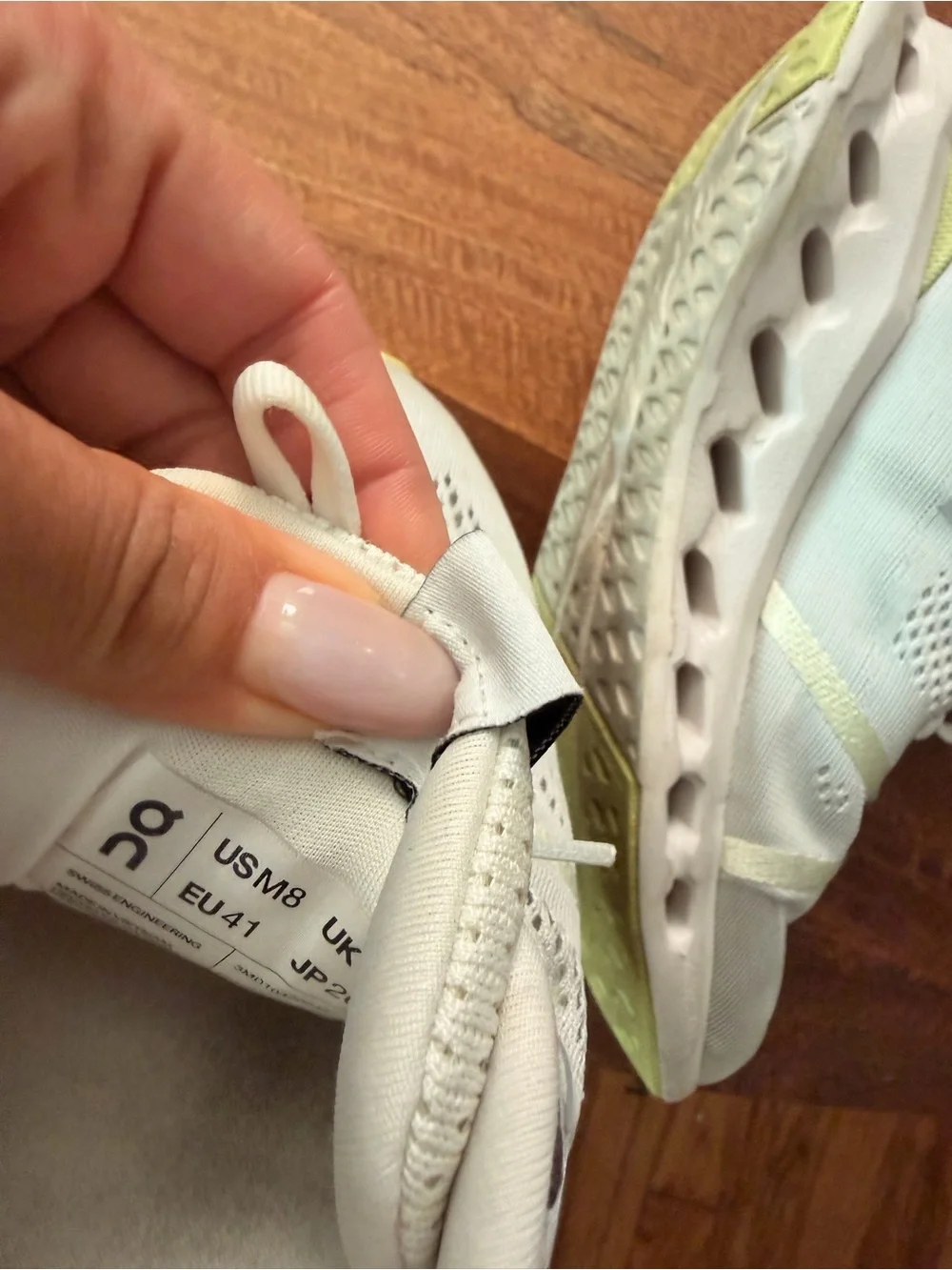 On Running Women's White Athletic Shoes with Yellow Accent
